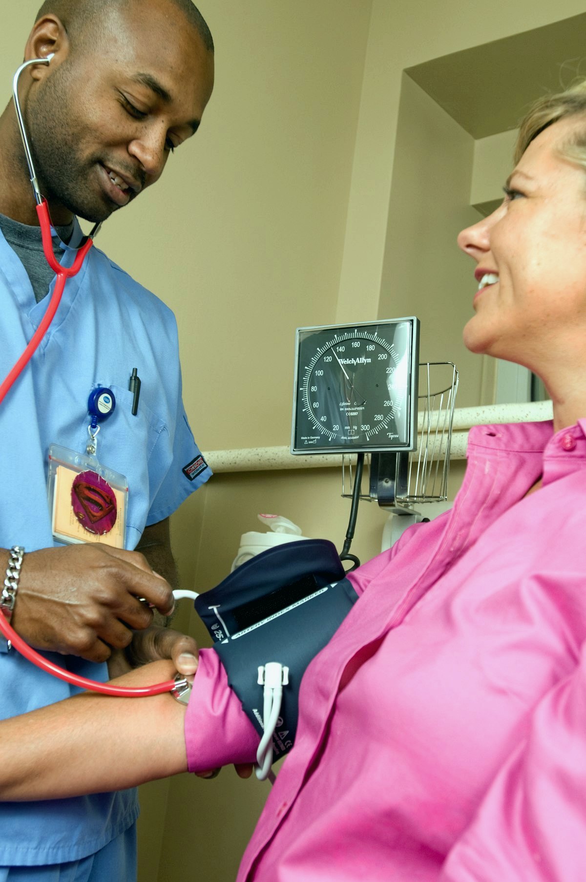 A health worker performing a point-of-care check at a community health centre.