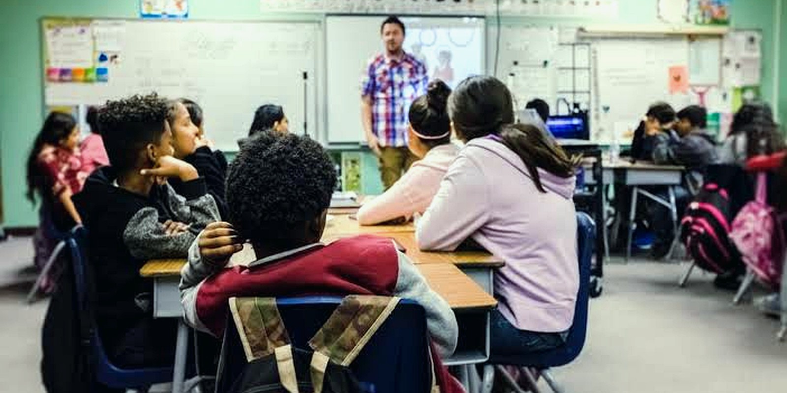 A primary-school classroom — the setting behind the teacher-burnout survey.
