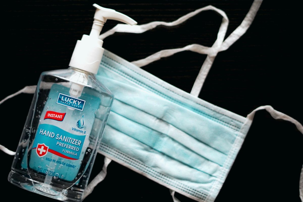 Hand sanitiser and protective mask — the infection-prevention context of the hospital study.